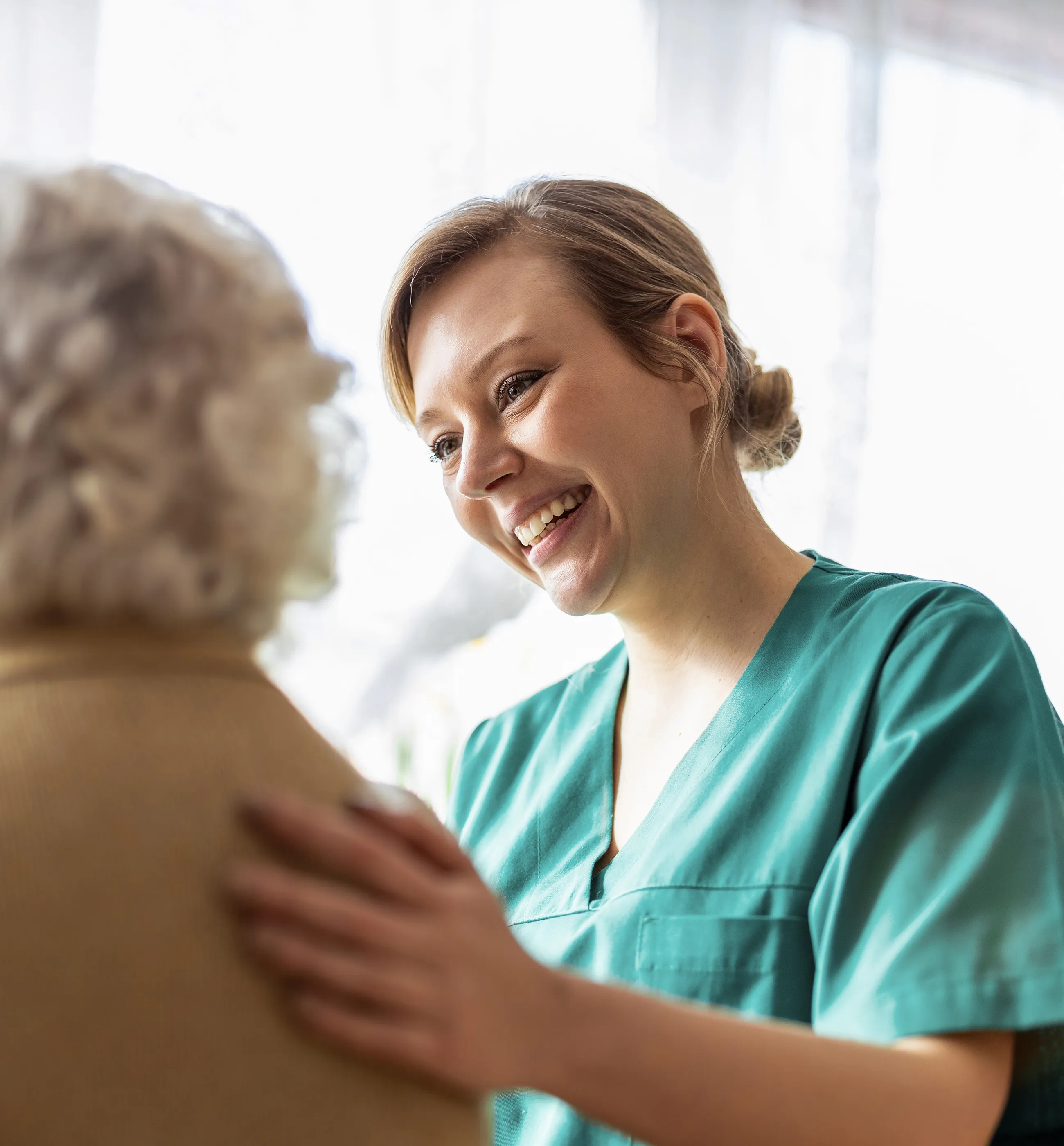 Aged care professional with a resident